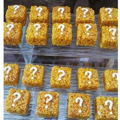 many square treats with question marks on them