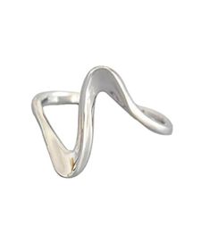 a silver ring with a curved design on the front and back ends, set against a white background