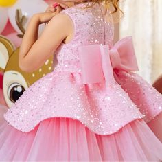 This Stunning Pink Dress Features Multiple Tiers Of Soft Tulle Creating A Voluminous Silhouette, Embellished Bodice With A Shimmering Effect, And A Large Bow Detail At The Waist. Pink Dresses For Kids, Ruffled Midi Dress, Kids Party Dresses, Dresses For Kids, Midi Ruffle Dress, Pink Dresses, Soft Tulle, Large Bow, Cute Desserts