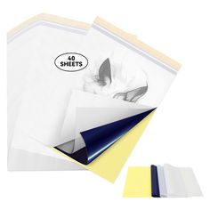 three sheets of white paper with blue and yellow edges are shown next to each other