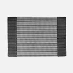 a black and white rug with horizontal stripes on it's side, against a gray background