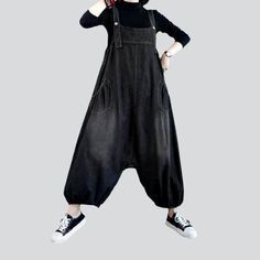 Be the talk of the town with our 2023 Spring Collection Women's Baggy Jean Jumpsuit street vibe for the trendy trendsetter.Why You'll Love It: Sanded for Style and Comfort: Crafted from premium denim with a medium wash. this jumpsuit features a sanded texture for a unique look and feel. Suspenders Closure: Keeping the baggy look intact. the suspenders closure ensures a snug and secure silhouette. Modern Street Style: With a casual silhouette and a touch of modern flair. this jumpsuit is perfect Spring Denim Overalls In Solid Color, Trendy Solid Color Denim Jumpsuit For Summer, Spring Denim Overalls, Casual Solid Denim Jumpsuit For Spring, Fall Relaxed Fit Jumpsuits And Rompers In Solid Color, Fall Relaxed Fit Jumpsuits And Rompers, Casual Baggy Jumpsuits And Rompers In Solid Color, Baggy Casual Jumpsuits And Rompers Solid Color, Casual Cotton Dark Wash Jumpsuits And Rompers