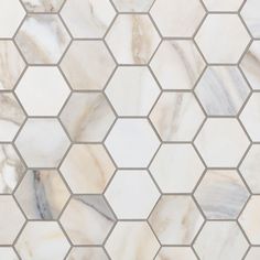 a white marble tile with hexagonal pattern