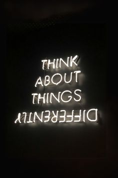 a neon sign that says think about things and be nice to someone in the dark