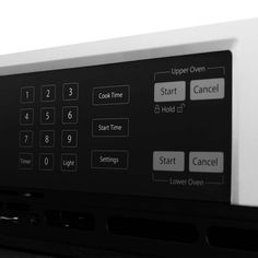 a close up view of the control panel on a microwave oven with buttons and timers