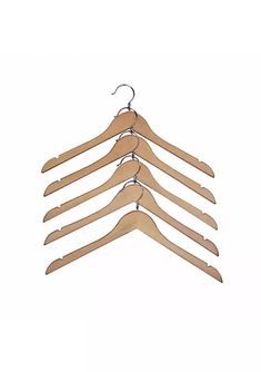 four wooden hangers are hanging on a white wall