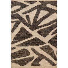 a rug with black and white designs on it