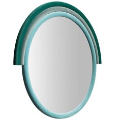 three round mirrors are stacked on top of each other, one is green and the other is blue