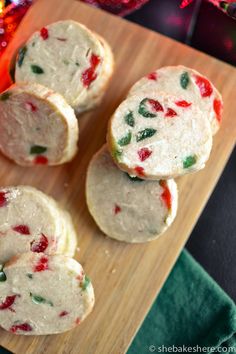 some cookies are sitting on a cutting board