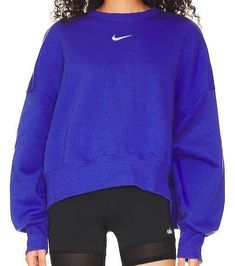 NIKE WOMEN'S NIKE SPORTSWEAR PHOENIX FLEECE CREWNECK SWEATSHIRT Size Small Style # DQ5761 - 430 Purple Rise up and transform your fleece wardrobe with strong cozy vibes. With a voluminous fit and exaggerated ribbing, this Phoenix Fleece sweatshirt gives you a look that's anything but basic. Smooth on the outside and cozy on the inside, brushed fleece is our go-to sweatshirt material for colder temperatures. Elongated ribbing at the cuffs and hem provides extra comfort and structure. Long Sleeve Purple Nike Fleece, 70s Tennis, Nike Sportswear Phoenix Fleece, Nike Cropped Hoodie, Nike Quarter Zip, Nike Pullover Hoodie, Tennis Tank Tops, Purple Fleece, Purple Sweatshirt