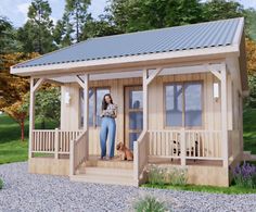 a woman standing on the porch of a small wooden cabin with her dog in front