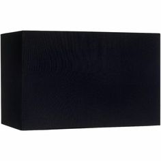 a large black box sitting on top of a white wall next to a light fixture