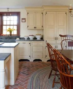 the kitchen is clean and ready to be used for cooking or eating, while also being used as a dining room