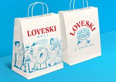 two white bags with the words loveski on them are shown against a blue background