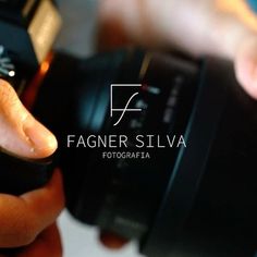 a person holding a camera in their hand with the word fagner sivia on it