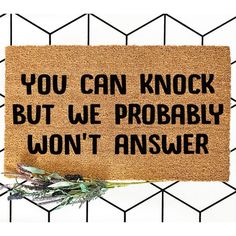 a door mat that says, you can knock but we probably won't answer