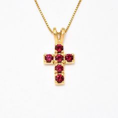 Ruby Cross Pendant set with Created Ruby in a flawless clarity & stunning red color, at 3mm diameter each (1 Ct all).  Gold Vermeil: 18k Gold over Solid 925 Sterling Silver ☞ made to last. Matching Ring & Earrings - please ask me Details : ♥ Each item comes in a cute GIFT BOX ✓ ♥ GUARANTEE on all materials ✓ ♥ Created Ruby in a flawless clarity ✓ ♥ 18k Gold over Solid 925 Sterling Silver ✓ ♥ Measurements: Ruby size 3mm diameter each, 1 Carat total ✓ ♥ Each stone set professionally - WellMade Craftmanship ♕ ♥ More Beautiful jewellery on www.etsy.com/shop/AdinaStone ☜ ✉ Shipping by Royal Mail ✉ Tracked Shipping Option - worldwide tracking - choose at checkout: U.K. 1 Day delivery ! USA & Worldwide ✈ 5-7 Days Standard Shipping speed: U.K. ✈ 2-3 days USA ✈ 5-10 days Europe (all countries) ✈ 5- Red Cross Necklace, Gold Ruby Necklace, Christian Necklace, Wedding Pendant, Matching Ring, Gold Cross Pendant, Necklace Red, Ruby Necklace, Birthstone Pendant