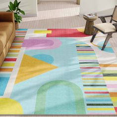 a brightly colored area rug in a living room