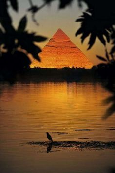 an image of the great pyramid at sunset