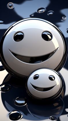 two smiley faces sitting on top of each other next to water droplets in the air