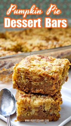 pumpkin pie dessert bars stacked on top of each other next to a serving dish with a spoon