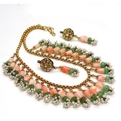 "Unique Vintage Coral Necklace Set 22k gold and single cut Diamond RARE find. Never Worn Vintage Indian Moughal Coral Emerald Necklace Set . 15\" length necklace. Coral - 110-135 cts Emerald- 30-45 cts Pearl 20-22 cts Single Cut Diamond 1 ct 22k Gold 40-42 gms Carved Light double colored Coral - Never Worn - in ORIGINAL condition - excellent condition with NO problems. Original Natural Carved Emerald Beads. The Earrings Measure 1.93 inchx.58 inch. Coral in the earrings measure .38inchx.29inch. E Emerald Necklace Set, Coral Jewelry Vintage, Coral Jewelry Set, 22k Gold Necklace, Pearl Necklace Designs, Beaded Necklace Designs, Coral Jewelry, Emerald Necklace, Summer Necklace