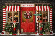 a store front decorated with christmas decorations and wreaths