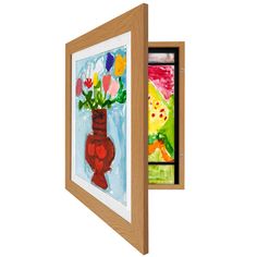 a painting with flowers in a vase on the wall next to a framed art piece