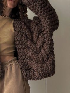 Winter Wool Cable Knit Cardigan, Winter Chunky Knit Cardigan, Oversized Winter Cable Knit Sweater Coat, Oversized Cable Knit Sweater Coat For Winter, Fall Chunky Knit Cardigan, Cozy Brown Chunky Knit Outerwear, Cozy Hand Knitted Fall Sweater Coat, Hand Knitted Sweater Coat For Fall Weather, Cozy Cable Knit Winter Cardigan