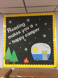 a sign that reads reading makes you a happy camper