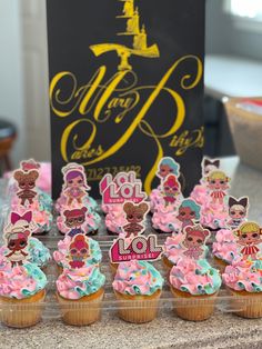 there are many cupcakes that have been made to look like barbie dolls on them