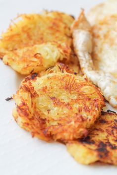 some fried food is on a white plate