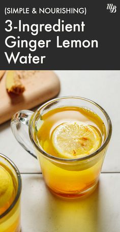 a glass mug filled with ginger lemon water