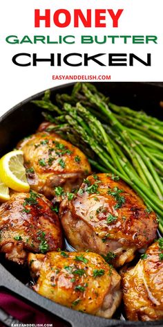 honey garlic butter chicken in a skillet with asparagus and lemon wedges