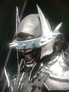 an image of a man with a helmet and metal gear on his face in the dark