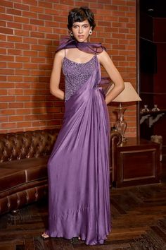 Purple saree gown with side high slit, intricate pleated draped panels, attached ruffle pallu, swirl pattern, tonal sequin and cut dana hand embroidered bodice. - Aza Fashions Draped Saree Gown, Gowns Purple, Saree Gowns, Draped Saree, Purple Saree, Gown For Women, Saree Gown, Drape Saree, Embroidered Bodice