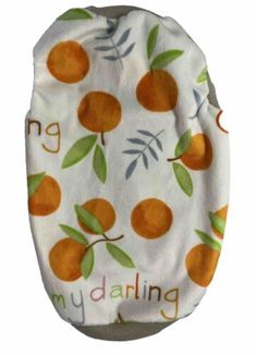 a cloth diaper with oranges on it and the words my darbling written in large letters