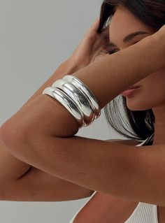 Silver-toned bangle pack Pack of three, fixed shape Princess Polly Lower Impact 100% reclaimed steel Bangle Outfit, Chunky Silver Jewellery, Coachella 2024, Womens Silver Jewelry, Silver Jewelry Box, Silver Bracelets For Women, Bangles Jewelry Designs, Chunky Jewelry, Jewelry Lookbook