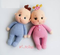 two crocheted dolls sitting next to each other