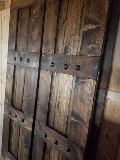 an open wooden door in a room