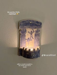 a light that is on the side of a wall with a quote above it reading, the perfect little nightlight adds so much warmth to any room in my home