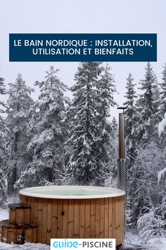 an outdoor hot tub surrounded by snow covered trees with the words le bain nordic installation utlisation et biefairts