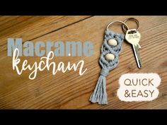 the macrame keychain is made out of yarn and has two keys attached to it