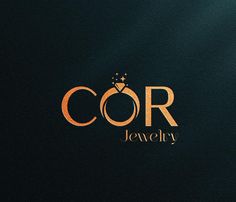 the word cor jewelry is written in gold on a black background