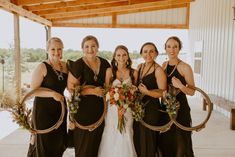 a group of women standing next to each other