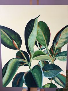 an oil painting of green leaves on a easel with purple walls in the background