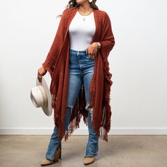 Get cozy with the Kayla Cozy Bohemian Ruana! Featuring delicate detailing and frayed borders, this ruana brings a touch of boho chic to any outfit. Stay warm and stylish with this playful addition to your wardrobe. One Size: S-3XL 100% Acrylic Cold hand wash Crochet Sweaters For Women, Mom Style Fall, Western Chic Fashion, Cozy Bohemian, Crochet Sweaters, Nashville Outfits, Winter Boho, Boho Chic Outfits, Country Outfits