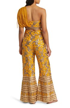 This sequined and beaded set features a cropped top with a single adjustable shoulder and palazzo pants with a high waist and side pockets. 15" top length; 30" inseam, 38" leg opening; 15" front rise; 18" back rise (size Medium) Top has drawstring-adjustable one-shoulder neck Pants have side-seam pockets Lined 100% viscose Spot clean Made in India Asian Owned/Founded Flare Palazzo Pants, Flared Palazzo, Black Palazzo Pants, Printed Palazzo Pants, Anarkali Gown, Blouse Length, Palazzo Pants, Cropped Top, Bottoms Pants