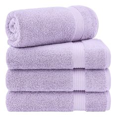 three lavender towels stacked on top of each other