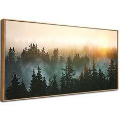 a forest with fog and trees in the foreground, at sunset or dawn canvas wall art print